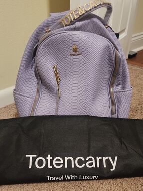 Tote and Carry Lavender  Backpack with Gold Hardware